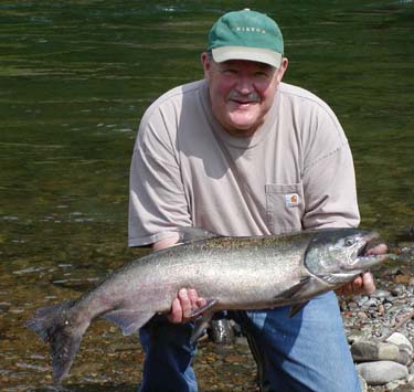 Jerry with a McKenzie River Spring Salmon. T-Shirt Days are the Norm when these Kings enter the McKenzie River