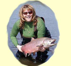 Jerri-Jo Payne and her Togiak River King Salmon. Her first King Salmon! Casting a Red Mag Wart brought it up